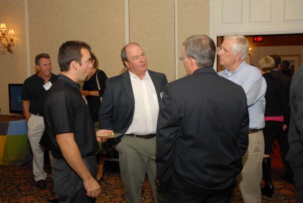 5x5x5 2012 don wells of dew construction  guests chatting.jpg